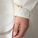 Organic linen sleeve detail button ecru